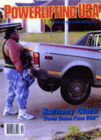 Anthony Clark lifting a car