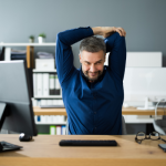 5 Desk Stretches You Can Do Right Now to Relieve Lower Back Pain