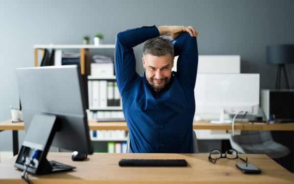 5 Desk Stretches You Can Do Right Now to Relieve Lower Back Pain