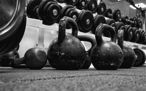 Dumbbells vs Kettlebells for Building Muscle