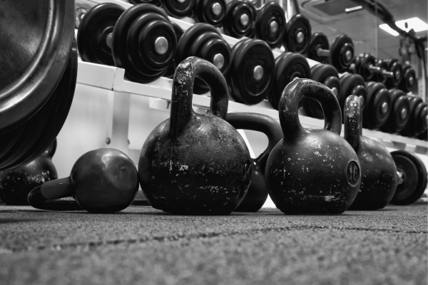 Dumbbells vs Kettlebells for Building Muscle